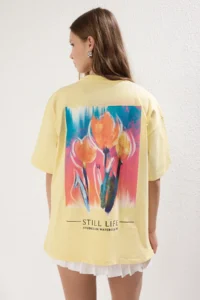 TRENDYOLMİLLA Light Yellow 100% Thick Cotton Oversized/Wide Pattern Front Back Printed Knitting T-Shirt