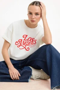 TRENDYOLMİLLA Ecru Slogan Oversized/Wide Pattern Drop Sleeve Short Sleeve Tok 100% Cotton Knitting T-Shirt