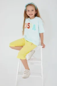 US Polo Assn. Base. Polo Assn Round Font Color Cream Girls' Capri Set