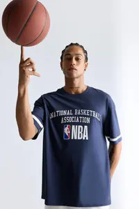 DeFacto 100% Cotton NBA Wordmark Oversize Wide Fit Crew Neck Short Sleeve T-Shirt