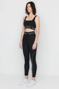 TRENDYOLMİLLA X Sagaza Studio Black Shaping Sports Leggings with Cord Piping Detail and Push Up Stitching - Image 5
