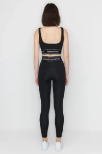 TRENDYOLMİLLA X Sagaza Studio Black Shaping Sports Leggings with Cord Piping Detail and Push Up Stitching - Image 7
