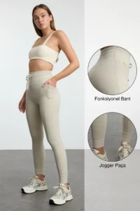 TRENDYOLMİLLA Stone Brushed Soft Material Pocket and Binding Detailed Full Size Knitting Sports Leggings