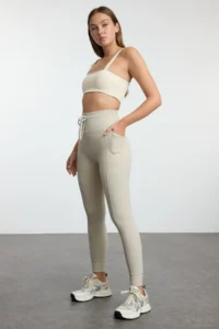 TRENDYOLMİLLA Stone Brushed Soft Material Pocket and Binding Detailed Full Size Knitting Sports Leggings - Image 2