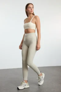 TRENDYOLMİLLA Stone Brushed Soft Material Pocket and Binding Detailed Full Size Knitting Sports Leggings - Image 6