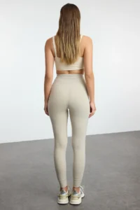 TRENDYOLMİLLA Stone Brushed Soft Material Pocket and Binding Detailed Full Size Knitting Sports Leggings - Image 8
