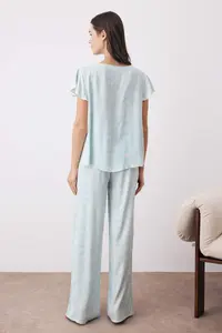 TRENDYOLMİLLA Light Blue Ethnic Patterned Ruffle and Binding Detailed Viscose Weaving Pajama Set - Image 4
