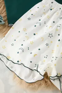TRENDYOLMİLLA Emerald Green Galaxy Patterned Baby Overlock Detailed OF shorts Knitting Pajama Set - Image 3