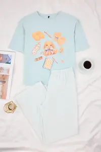 TRENDYOLMİLLA Mavi 100% Cotton Striped and Fun Patterned Knitting Pajama Set - Image 5