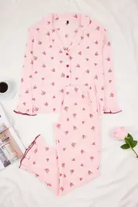 TRENDYOLMİLLA Pink Floral Ruffle and Baby Overlocked Crepe textured Knitting Pajama Set - Image 5