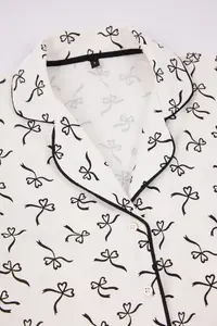 TRENDYOLMİLLA White 100% Cotton Ribbon Patterned Piped Knitting Pajama Set - Image 11