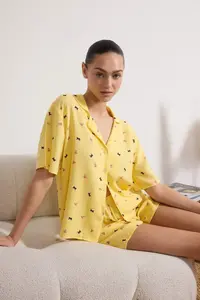 TRENDYOLMİLLA Yellow Flower and Ribbon/Bow Patterned Viscose Weaving Pajama Set - Image 2