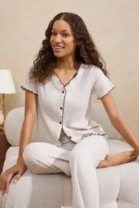 TRENDYOLMİLLA Beige Melange Baby Overloklu Ribbed Knitting Pajama Set - Image 3