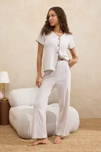 TRENDYOLMİLLA Beige Melange Baby Overloklu Ribbed Knitting Pajama Set - Image 4