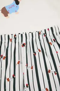 TRENDYOLMİLLA White-Multicolored Dog Patterned Cotton Lycra Soft Touch Knitting Pajama Set - Image 3