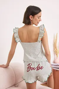TRENDYOLMİLLA White Polka Dot Slogan Printed Frilly Knitting Pajama Set