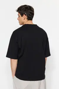 MAN Black Oversized 100% Cotton Minimal Text Printed T-Shirt - Image 2