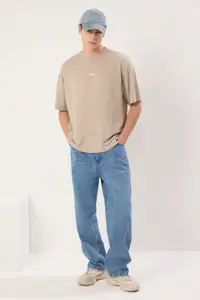 MAN Stone Oversized / Wide Cut Metal Label Detailed interlock T-Shirt