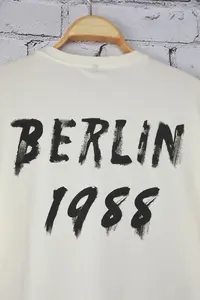 MAN Ecru Oversized/Wide Cut Berlin Back Printed 100% Cotton T-Shirt - Image 4