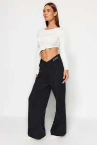 TRENDYOLMİLLA Black Print Detailed Wide Leg/Relaxed Cut Asymmetric Waist Knitting Pants - Image 4
