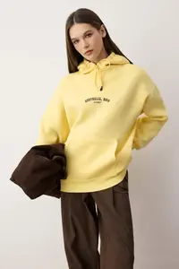 TRENDYOLMİLLA Light Yellow Thick Hooded Front and Back Printed Oversized Knitting Sweatshirt - Image 2