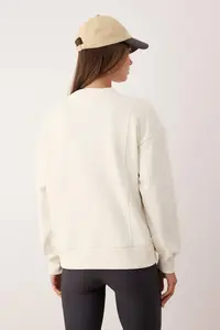 TRENDYOLMİLLA Ecru Oversized/Wide Pattern Sewing Detail Thick Fleece Inside Knitting Sweatshirt - Image 4
