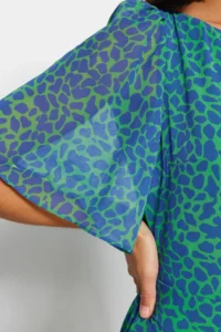 TRENDYOLMİLLA Green animals Patterned A Cut Angel Arm Lined Siphon Flight Flight Weaving Midi Dress - Image 8