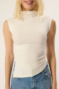 TRENDYOLMİLLA Ecru Dog collar Short Sleeve Drape Detailed Fitted Asymmetric Knitting Blouse - Image 3