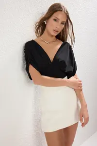 TRENDYOLMİLLA Black with flywheel Plain Fitted/Fitted snaps Flexible Knitting Bodysuit .D.00003
