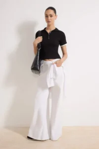 TRENDYOLMİLLA Black Fitted Polo Shirt Collar Short Sleeve Piped Ribbed Flexible Knitting Blouse - Image 2
