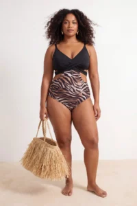 Trendyol Curve Zebra Patterned Cut Out Detailed Back tied up Covered Plus Size Swimsuit