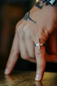 The Collection Unisex Silver Plated Adjustable Ring with Mini Sword Figure