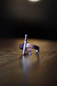 The Collection Unisex Silver Plated Adjustable Ring with Mini Sword Figure - Image 2