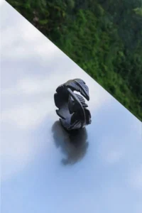The Collection Adjustable Black Men's-Women's Ring with Feather Leaf Figure