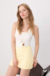 TRENDYOLMİLLA Yellow Asymmetric Belt Detailed Weaving Mini Shorts Skirt - Image 2
