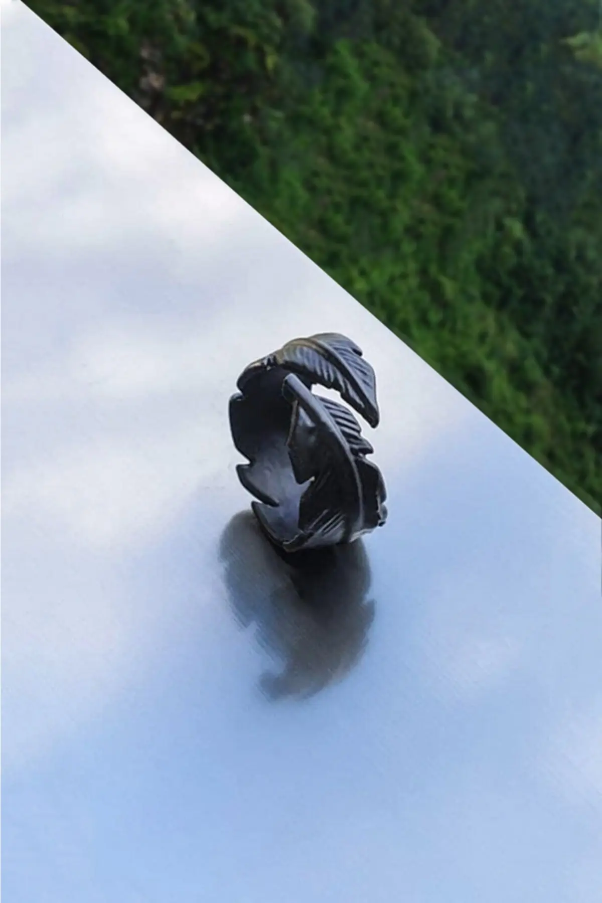 The Collection Adjustable Black Men's-Women's Ring with Feather Leaf Figure