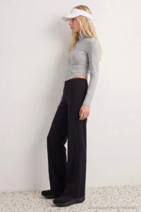 TRENDYOLMİLLA Black Brushed Soft Material Loose Flare Knitting Sports Leggings - Image 3