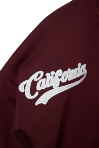 TRENDYOLMİLLA Burgundy Color Blocked Inside Fleece Embroidered Drop Sleeve snaps Crop Knitting College Sweatshirt - Image 2